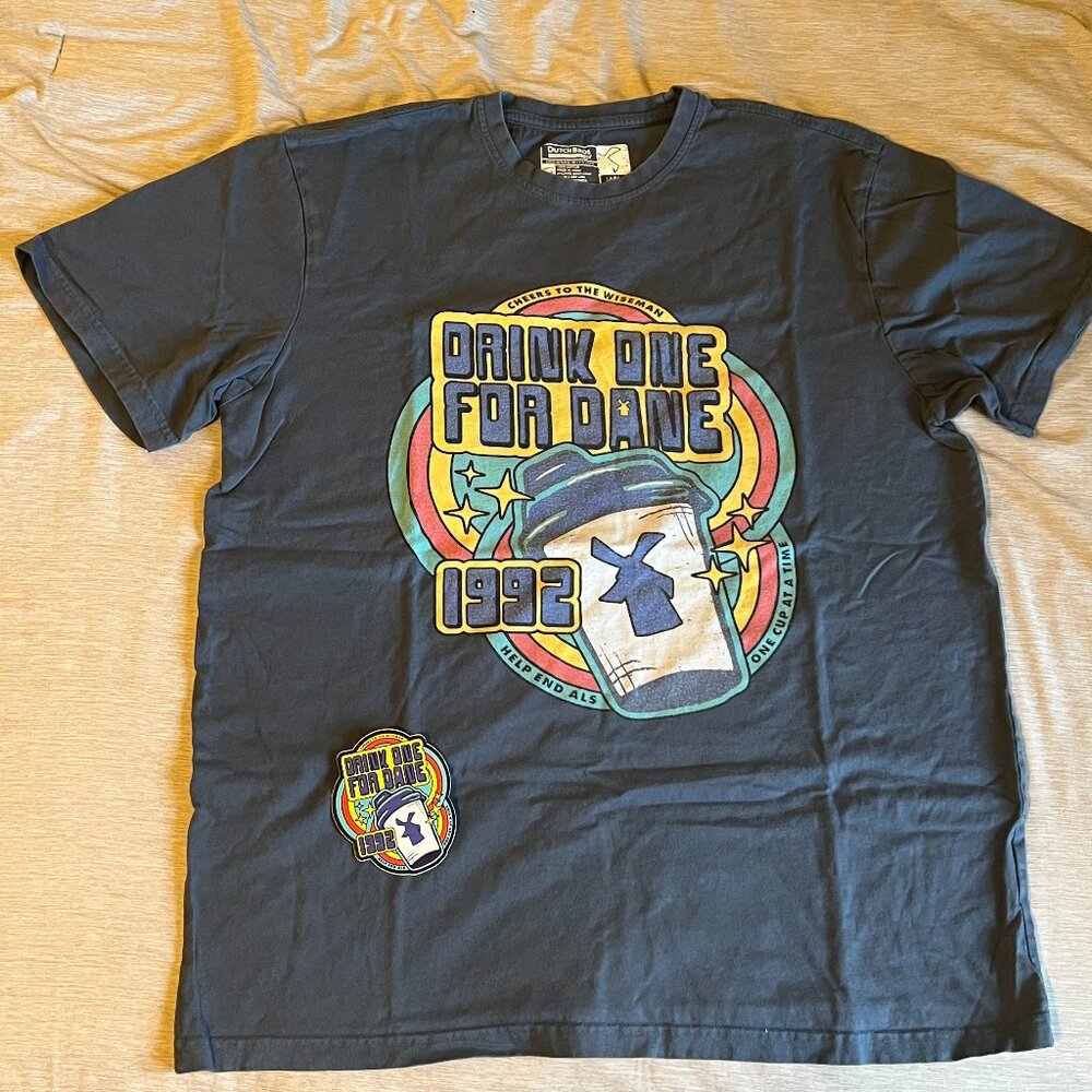 Dutch Bros “Drink One For Dane” Graphic Tee – L Unisex